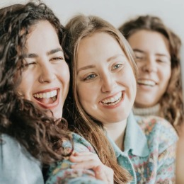 women smiling for a picture